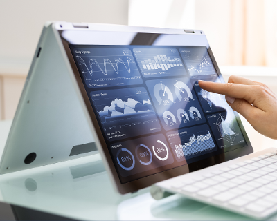 Tablet with various programmes running on screen to represent digital technology